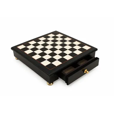 Zwart-wit houten schaakbord op voet met geopende opbergschuif